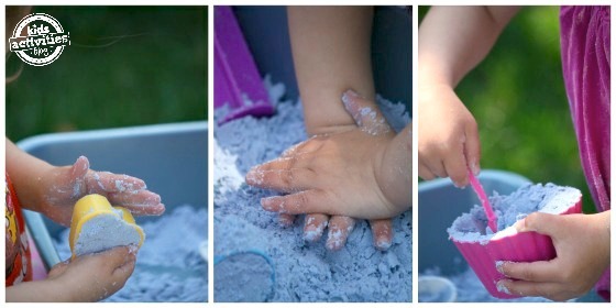 Toddler-Safe Cloud Dough being played with by kids by putting it in a heart mold, patting it, and digging it with a small shovel