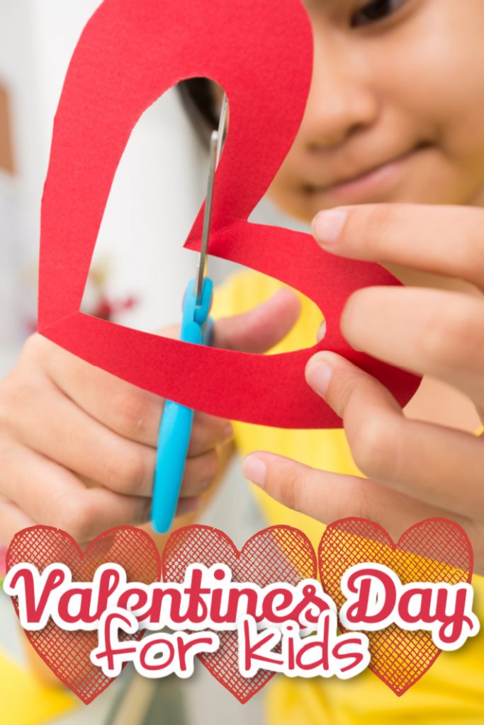 Valentines Day for Kids is full of Valentines crafts Valentines coloring pages and cards - Kids Activities Blog - girl cutting out paper heart