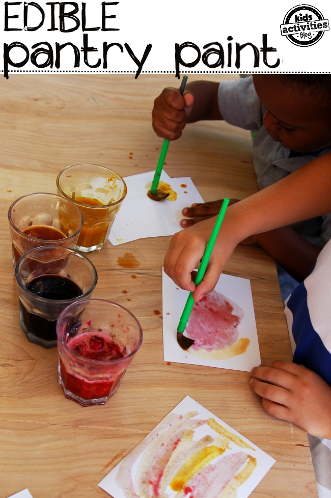 Spice paint recipe - edible paint recipe for kids to learn about colors and tastes - shown are two kids painting pictures with homemade spice paint