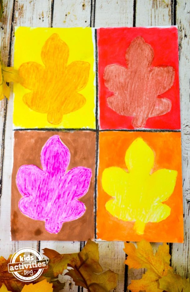 The orange leaf has a yellow background, the red leaf has a red background, the purple leaf has a brown background, and the yellow leaf has an orange background making this fall leaf art project beautiful.