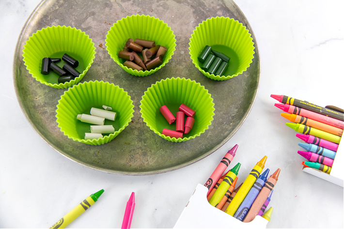 Melt crayons in individual silicone cupcake liners to make colors for your homemade candles.
