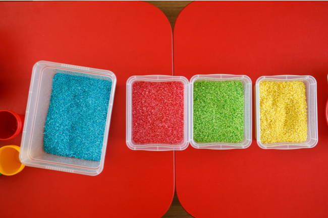 Dyed rice in the colors of blue red green and yellow - Kids Activities Blog