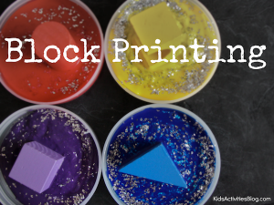 block painting with primary colors, a great process art project for preschoolers