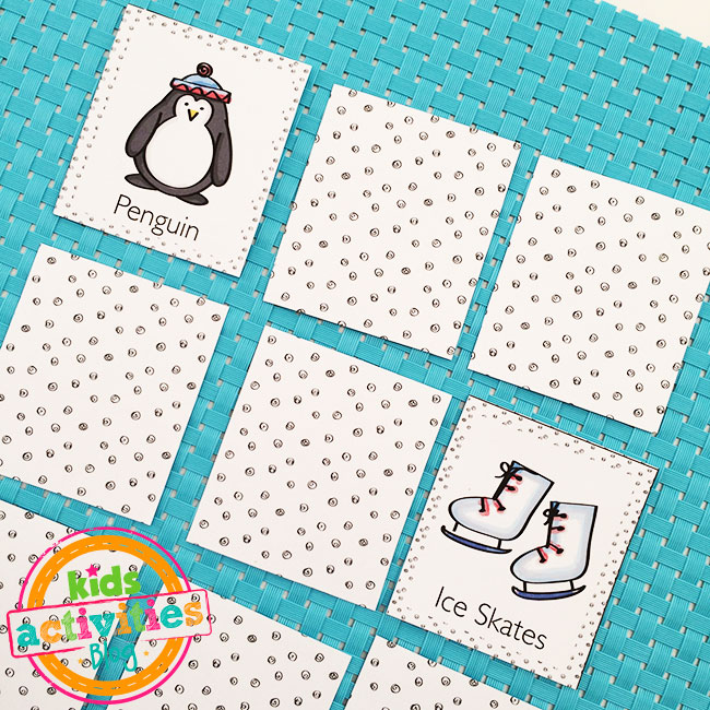 Play the Winter Memory Game - cards in play showing a non-pair revealed of a penguin and ice skates