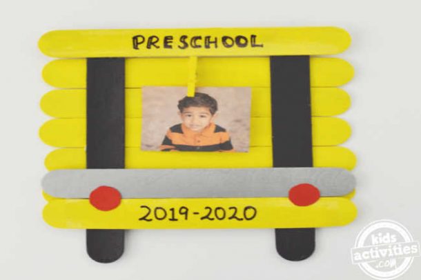 back to school pictures frame is shown with a photo attached to clothes pin in school bus frame - school bus images