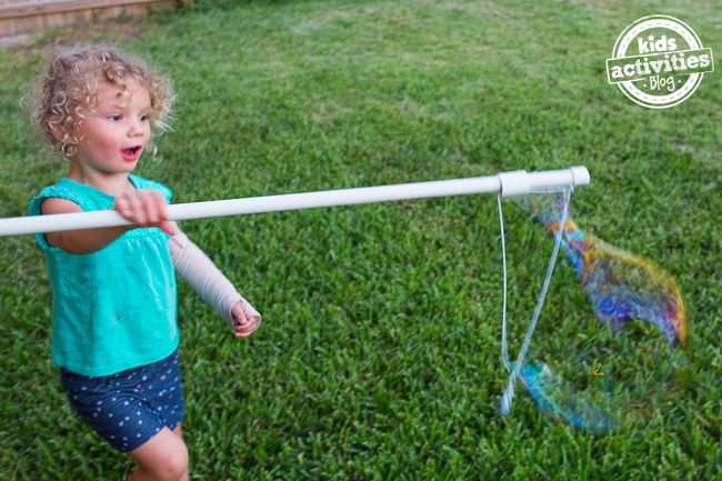 pvc project - make a bubble wand to make giant bubbles from Kids Activities Blog