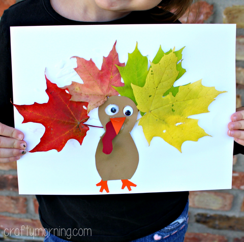Leaf turkey craft for kids from Crafty Morning.  Finished leaf turkey show held by child