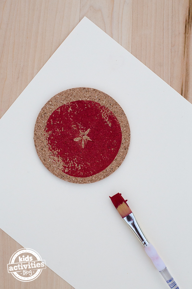 Making Apple Print Coasters is a fun craft to do with kids after visiting an apple farm. Kids will enjoy seeing the "star" on the inside of the apple, then stamping it onto a cork coaster to use as an ornament, gift, or coaster for home. This craft requires basic supplies and can be done at home, school, or daycare.