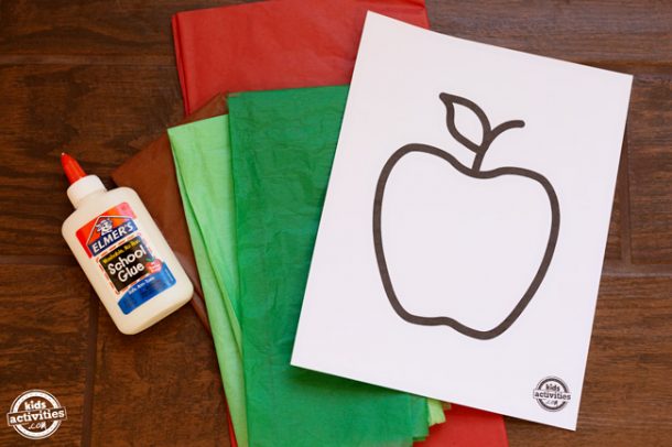 White glue, apple printable on white cardstock and red, green, and brown tissue paper. 