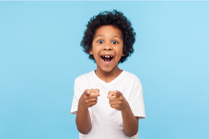Child laughing at a back to school joke - Kids Activities Blog