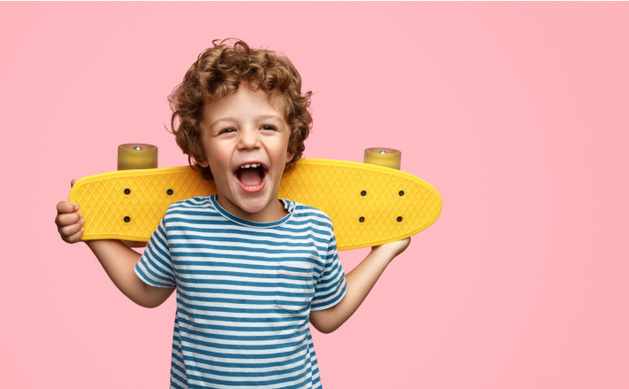 stop making me laugh with these silly jokes for kids - Kids activities blog - child with skateboard laughing