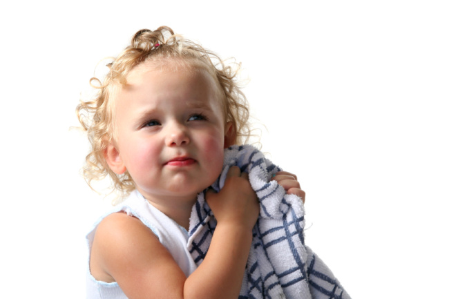Favorite Dish Towels to Make Baby Bibs - Kids Activities Blog - toddler hugging a dish towel