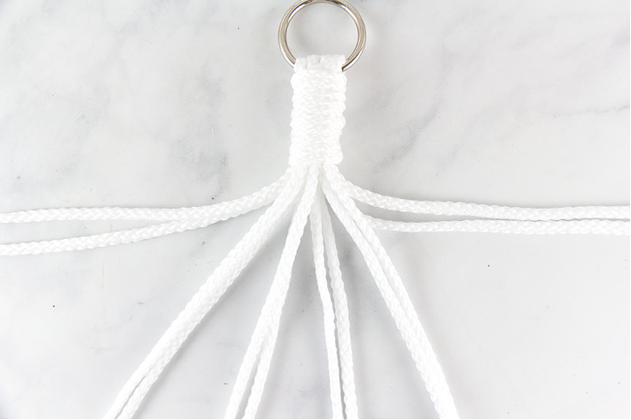 Instructions for separating cord to make a macrame planter.