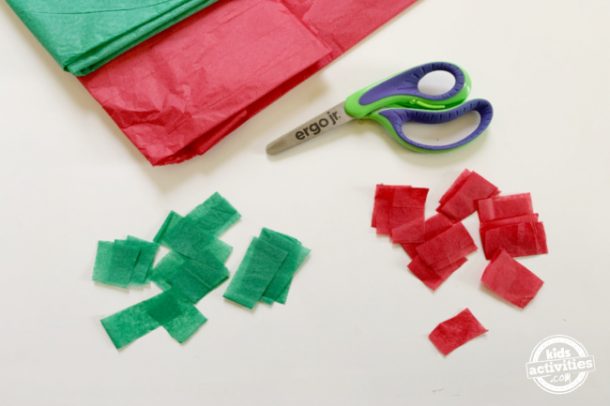 tissue paper is cut into small squares to fill in the free printable mexican flag