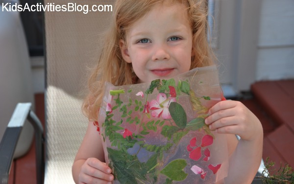 Easy nature collage art for younger kids like preschoolers - flowers and leaves pressed - great idea for Earth Day.