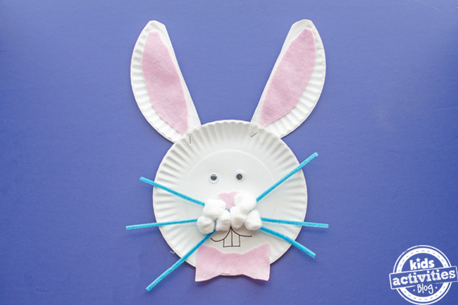paper plate easter bunny craft step 8 staple the ears to the paper plate