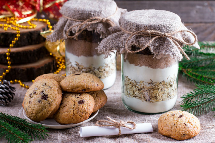 cookie ingredients in a jar - Mason jar gifts - with a plate of cookies