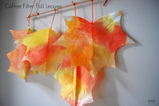coffee-filter-leaf-craft-for-kids that is white, orange, and yellow