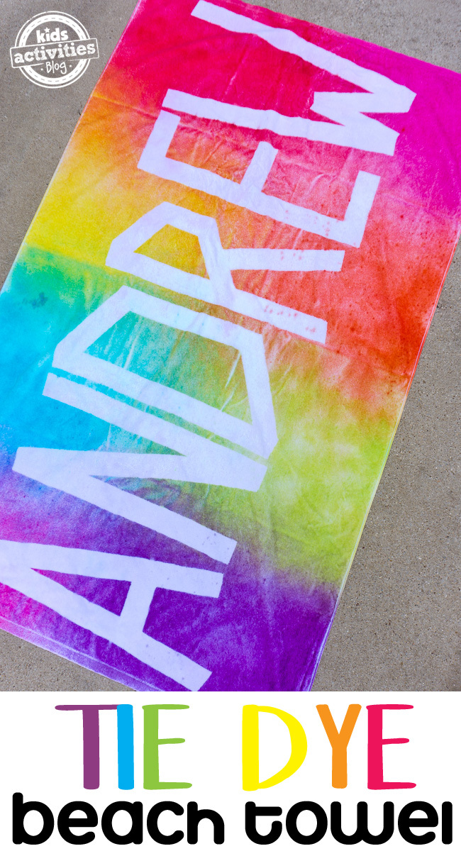 Personalized Tie Dye Beach Towel - finished DIY project with rainbow tie dye and personalized with name Andrew