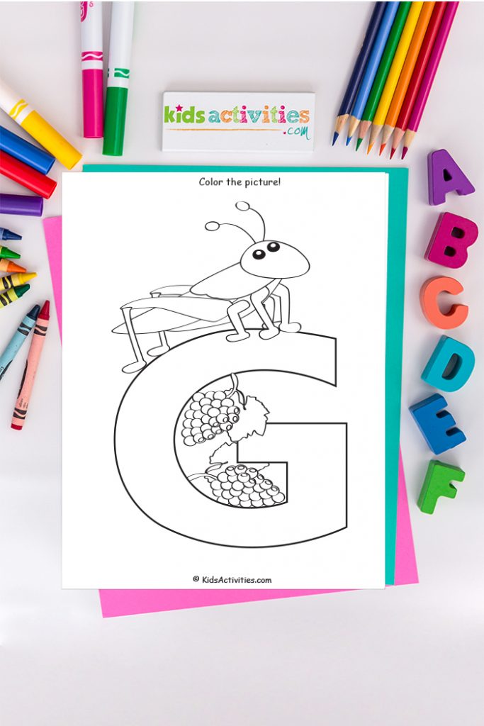 Letter G coloring page - capital letter G with grasshopper and grapes - on background of ABC's markers and crayons