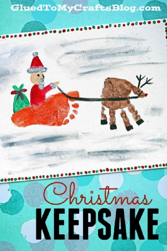 Santa sleigh made out of a footprint and handprint reindeer create this Christmas keepsake