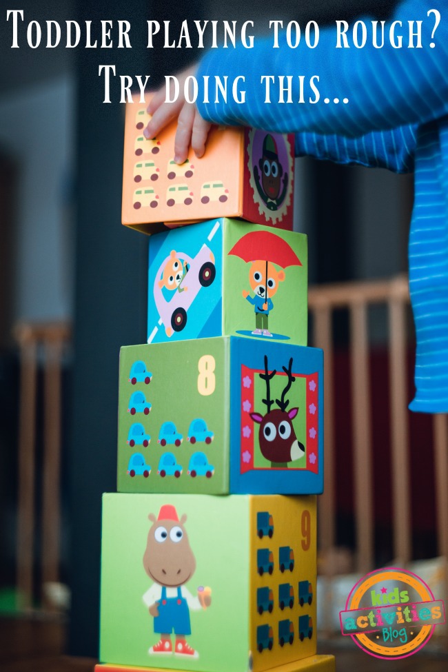 If Your Toddler Is Playing Too Rough - toddler stacking blocks pictured - Kids activities Blog
