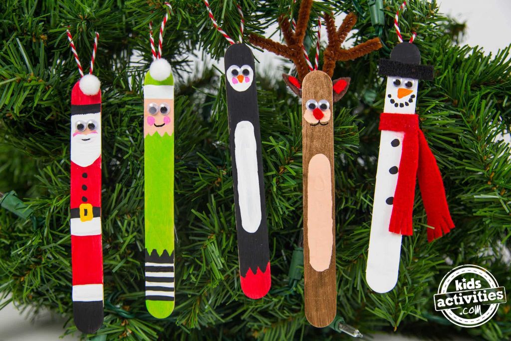 Popsicle Stick ornaments hanging on a Christmas tree